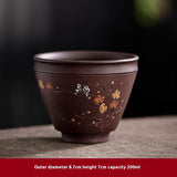 purple clay tea cup with plum blossom pattern