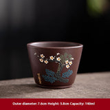handmade purple clay tea cup