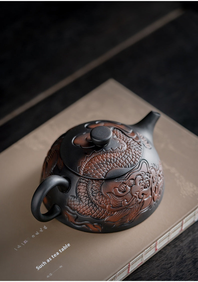 Xianglong Purple Pottery Teapot with relief crafts