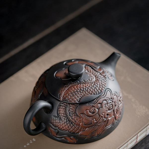 Xianglong Purple Pottery Teapot with relief crafts
